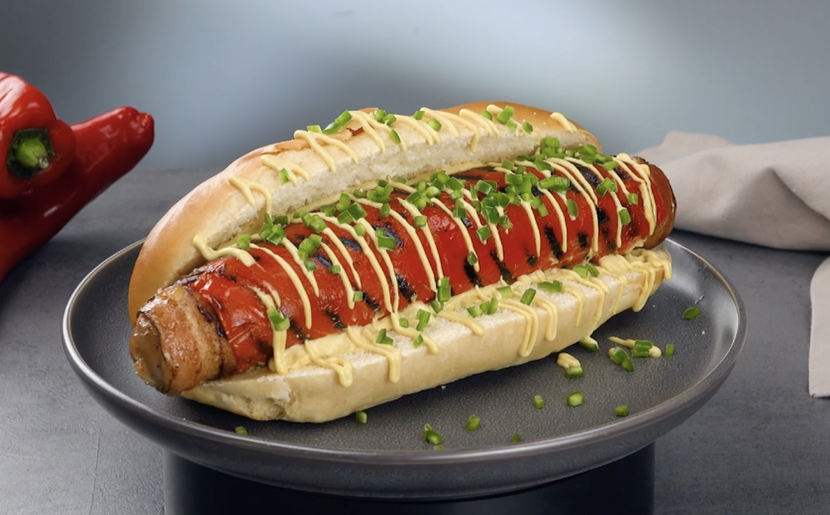 Cheese-Stuffed Brats Wrapped In Bacon